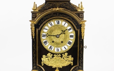 Horloge boulle française du 19e siècle avec incrustations en bronze et laitonHorloge boulle française du...