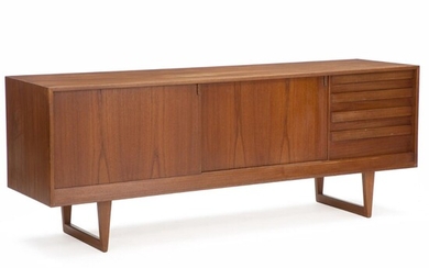 SOLD. Kurt Østervig: Sideboard of teak. Front with four drawers and two sliding doors. H. 80.5 cm. L. 210.5 cm. D. 56 cm. – Bruun Rasmussen Auctioneers of Fine Art
