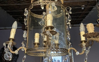 Lanterne en bronze doré et pampilles de verre à huit lumières. Style Louis XVI Hauteur...