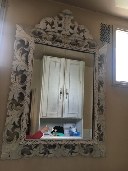 Large Henri II mirror in carved wood with white