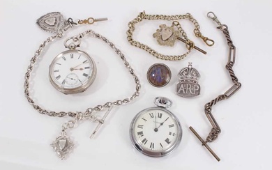 Late Victorian silver pocket watch on silver watch chain with two silver fobs