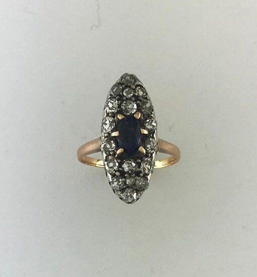 Marquise ring in gold 750°/°°° and silver set with a sapphire enhanced with diamonds TA, Fine 19th century workmanship, Finger size 55, (grindings), Gross weight: 4,27g