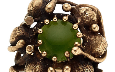 Nephrite Jade, Gold Ring The ring centers a round-shaped...
