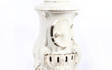 Ornate cast iron antique wood burning stove with white enamel. 27"H x 15"W x 29"D