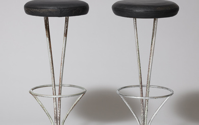 PIET HEIN. Bar stools, black leather, chrome-plated metal, Denmark. (2nd).