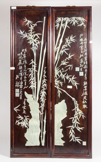 Pair of chinese hard wood framed hard stone mounted wall han...