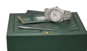 ROLEX. A FINE 18K WHITE GOLD AUTOMATIC WRISTWATCH WITH SWEEP CENTRE SECONDS, DAY, DATE, BRACELET, ORIGINAL GUARANTEE AND BOX, SIGNED ROLEX, OYSTER PERPETUAL, DAY-DATE, REF. 218239, CASE NO. M692526, CIRCA 2007