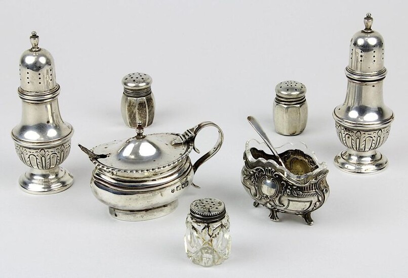 Set of salt and pepper shakers, Saliere and mustard pots, 1st half of the 20th century, consisting of: Salt and pepper shakers in baluster form, sterling silver; mustard pot made of sterling silver, England, London, 1927, with spoon; Saliere in...
