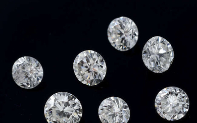 Seven brilliant-cut diamonds, weighing 0.84ct total.