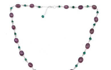 Star Lot : A very nice example of an Amethyst and Emerald ge...