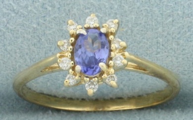 Tanzanite and Diamond Halo Ring in 14k Yellow Gold