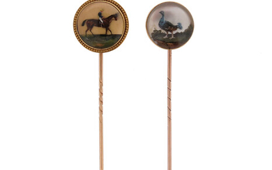 Two gold-mounted reverse carved crystal intaglio stick pins