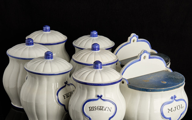 WILHELM KÅGE. A set of eight flintware jars, Gustavsberg, 1930s.