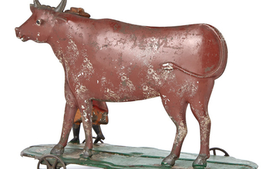 Woman and Cow Tin Toy