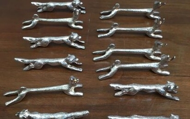 12 petits porte-couteaux en métal à décor... - Lot 59 - Richard Maison de ventes