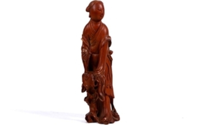 A Chinese boxwood carving of a young lady...