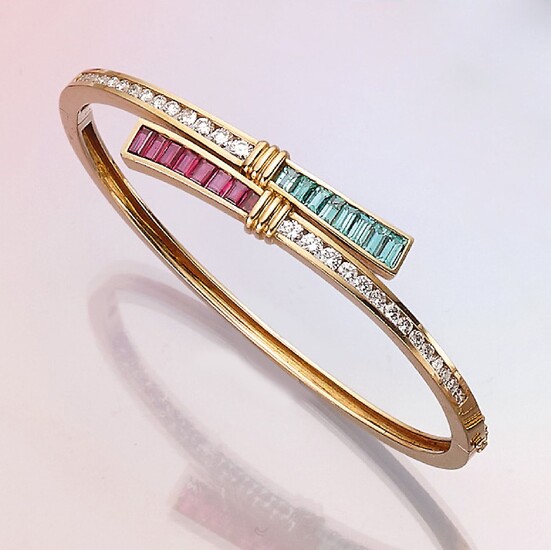 18 kt gold bangle with coloured stones...
