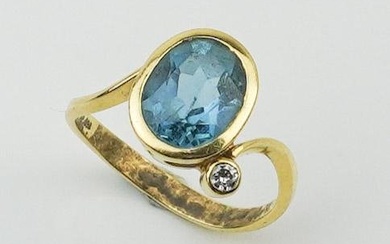 18KYG Blue Topaz and Diamond Ring