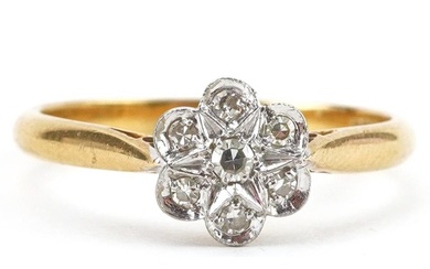 18ct gold diamond flower head ring, the central diamond appr...