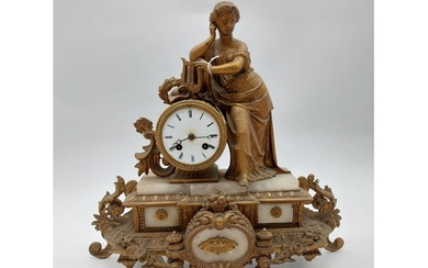 19th C. gilded spelter clock surmounted by Classical figure....