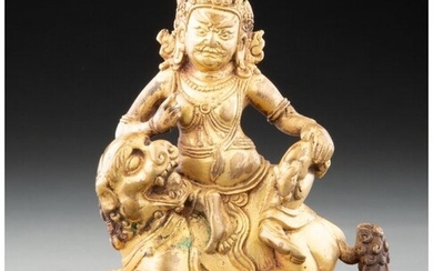 28059: A Sino-Tibetan Gilt Bronze Deity 4-1/2 x 4 x 2 i