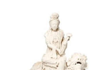 A CHINESE BLANC DE CHINE FIGURE OF GUANYIN AND A L…