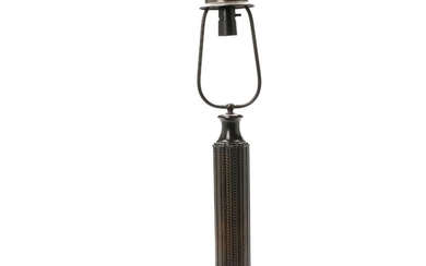 Just Andersen: Table lamp of patinated “disko” metal. Stem with stylized leaf ornaments. H. incl. shade holder 66.5 cm.
