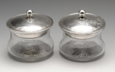 A pair of 1920's silver lidded powder pots, each of