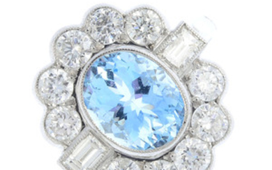 An aquamarine and diamond cluster ring. View more details
