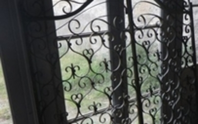 Pair scrolled iron garden gates