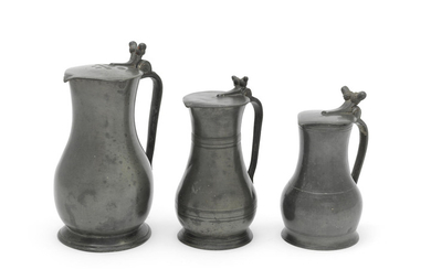 Three pewter lidded flagons, made in England for export to Guernsey, circa 1750-1830