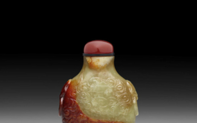 A YELLOW AND RUSSET JADE 'DRAGON' SNUFF BOTTLE