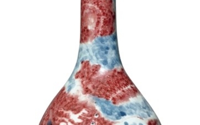 AN UNDERGLAZE-BLUE AND COPPER-RED 'DRAGON' BOTTLE VASE QING DYNASTY, 18TH CENTURY
