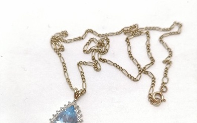 9ct hallmarked gold pear shaped blue topaz & diamond pendant...