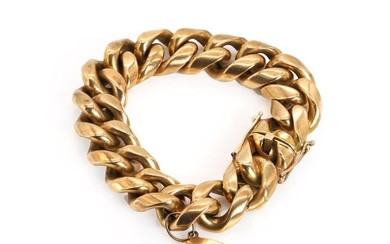 A 14ct gold solid curb link bracelet with a medical alter charm