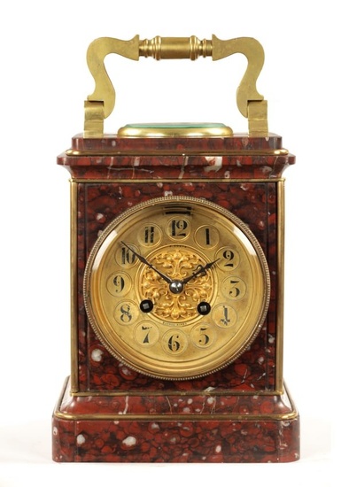 A 19TH CENTURY FRENCH GILT BRASS AND ROUGE MARBLE MANTEL CLOCK