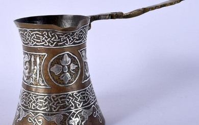 A 19TH CENTURY MIDDLE EASTERN SILVER INLAID HEATING