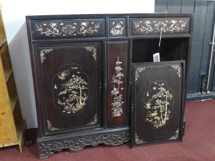 A 19th century Chinese hardwood cabinet, with mother of pear...