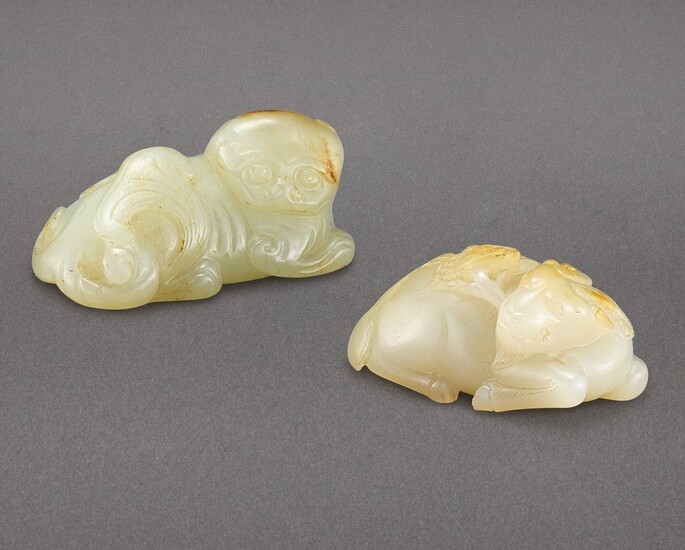 A CELADON AND RUSSET JADE FIGURE OF A LION AND A JADE 'GOAT AND LINGZHI' GROUP QING DYNASTY