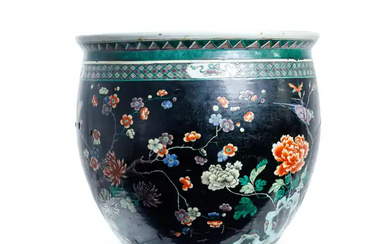 A Chinese black-ground famille verte jardinière Qing dynasty, 19th century Enamelled around...