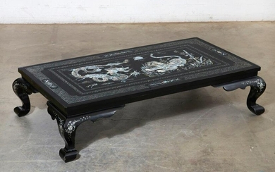 A Chinese black lacquer coffee table