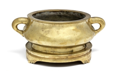 A Chinese bombé-shaped bronze censer. Xuande mark, but 18th-19th century. Weight of censer 4670 g. Weight of base 2365 g. (2)