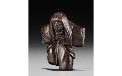 A DRAMATIC WOOD NETSUKE OF A NOH DANCER, ATTRIBUTED TO MIWA