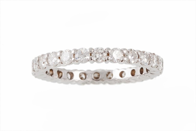 A FULL BANDED DIAMOND ETERNITY RING, set with brilliant cut ...