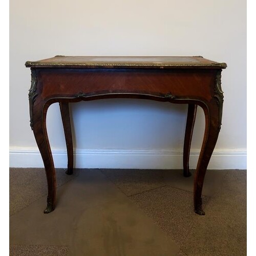 A French early 19th Century walnut and kingwood centre table...