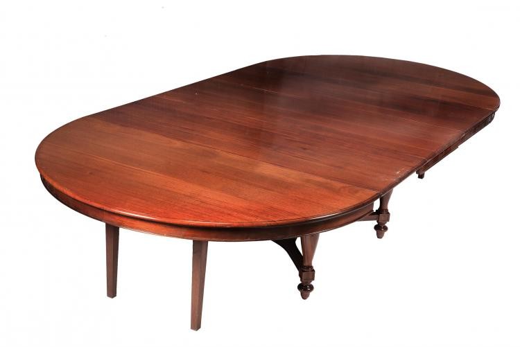 A French mahogany extending dining table