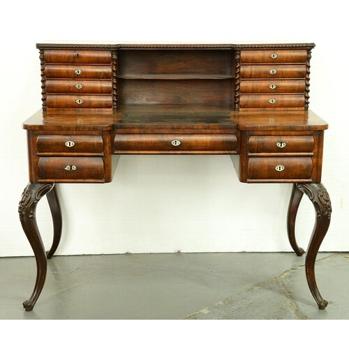 A French rosewood writing table, c1860, the superstructure...