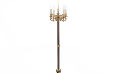 A French standing lamp of bronze with five lighting arms. 20th century....