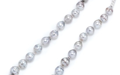 A GRADUATED SILVER SOUTH SEA PEARL NECKLACE; composed of 27 cultured baroque pearls, 12 - 14.7mm round with good lustre to silver be...