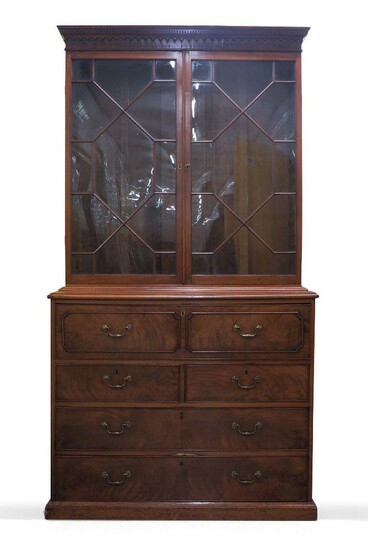 A George III mahogany secretaire bookcase, the moulded cornice above pair of astragal glazed doors, secretaire drawer and two short over three long drawers, raised on plinth base, 220cm high, 116cm wide, 56cm deep